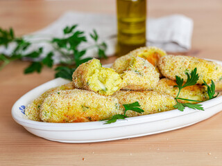 Rice and potatoes croquettes baked. Vegan food