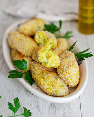 Rice and potatoes croquettes baked