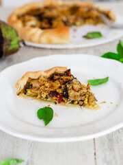 Savory tart with aubergines, tofu and sun-dried tomatoes. Vegan recipe 