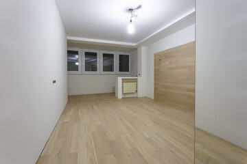 Empty unfurnished room with minimal preparatory repairs. interior with white walls