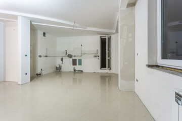 Empty unfurnished room with minimal preparatory repairs. interior with white walls