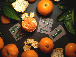 Mandarines and leaves, 2021 New year bachground or christmas card