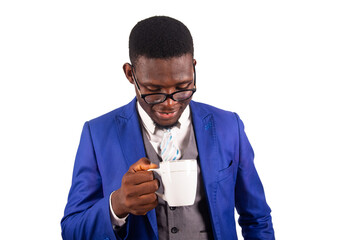 close-up of a young businessman with cup of coffee, smiling