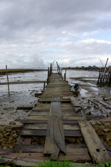 view of the broken old docks and piers at Cais Palatifico on the Sado River Estuary