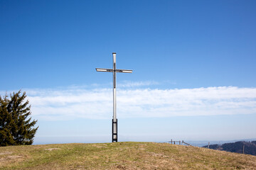 Fototapeta na wymiar Summit cross of Rechelkopf mountain, Bavaria, Germany