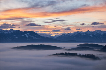 Sunrise over a sea of fog