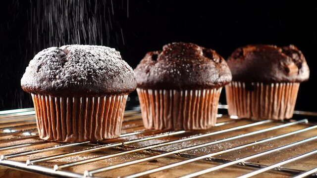 Sprinkle three muffins with icing sugar