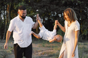 Happy family spends time in nature. Happy together