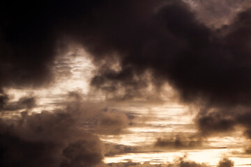 Dramatic sky with clouds at sunset