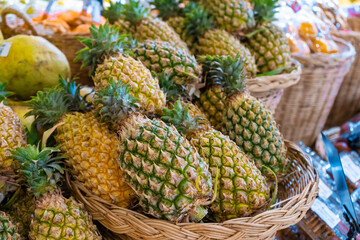 Pineapple counters in the grocery section of the supermarket