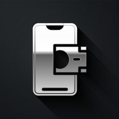 Silver Mobile banking icon isolated on black background. Transfer money through mobile banking on the mobile phone screen. Long shadow style. Vector.