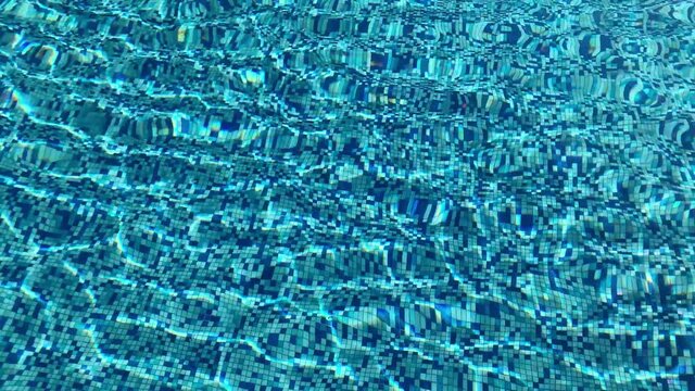 Crystal clear water in a swimming pool with sunlight casting shadows in the water and on the tiled floor - textured background