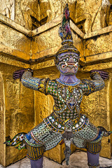 Fototapeta premium Giant statue and sculptures at the grand palace in Bangkok a beautiful display of culture and arts in Thailand