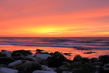 Fototapeta na wymiar A beautiful sunrise over the North Sea from the Yorkshire coast.