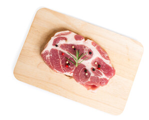 Raw meat with spices in wooden board isolated on white background.