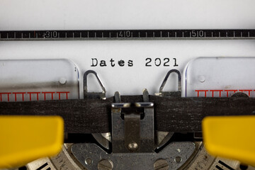 Dates 2021 written on an old  typewriter