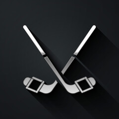 Silver Ice hockey sticks icon isolated on black background. Long shadow style. Vector.