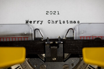 Merry Christmas 2021 written on an old typewriter