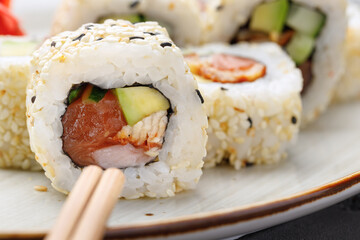 Japanese sushi roll on plate close up