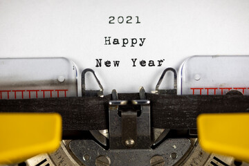 Happy New Year 2021 written on an old typewriter