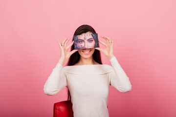 Cosmetologist beautician holding a tool in her hands, permanent makeup master, permanent makeup