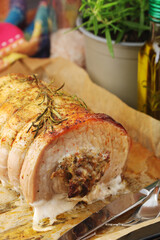 Pork rolled meat with mushrooms backed in the oven