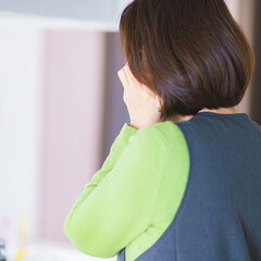 Japanese senior woman use smart phone in living room