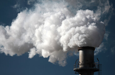Factory smoke pipe sending smoke to the atmosphere.