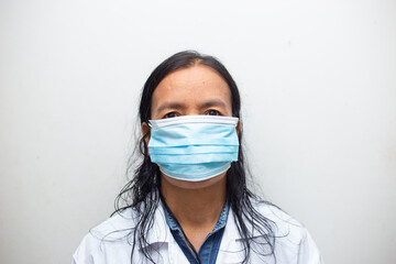 Elderly asian woman in a protective mask protection from Covid19 virus disease