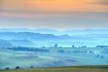 Obraz premium DAWN BREAKS OVER FARMLANDS. Underberg countryside, Kwazulu natal, South Africa.