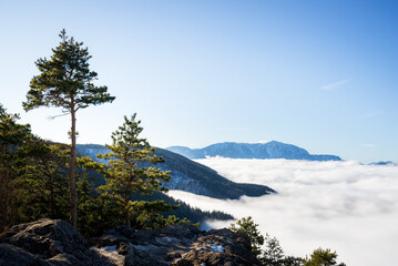 Cloud inversion at mountain ridge Hohe Wand in Lower Austria