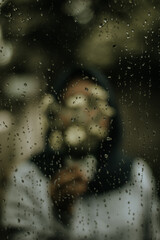 woman with rain drops