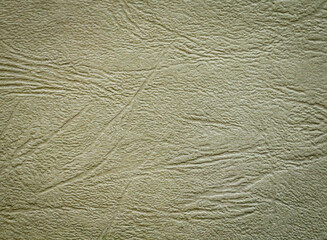 Eine Textur auf Leder oder eine Textur auf gepressten Papier.