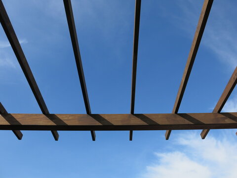 the wooden structure of vintage house and blue sky design for new life concept