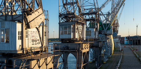Old harbor cranes in the center of Antwerp.