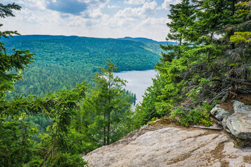 Mont Brassard hike in Parc Regional des 7 chutes in Quebec. This 8.5 kilometers hike offers great view of the typical nordic landscape