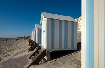 Striped beach cabins in Hardelot, France.