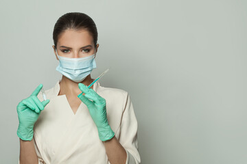 Vaccination concept. Doctor or nurse with syringe and ampoule injecting on white background