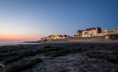 Scenic view of the seafront of Ambleteuse on the French Opal Coast at sunset.