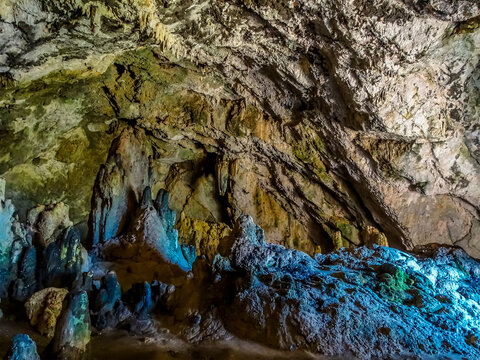 A view towards the rear of the Agia Sofia cave in the Topolia Gorge, Crete on a bright sunny day
