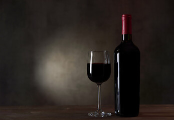 A Bottle Of Red Wine And Filled A Wine Glass