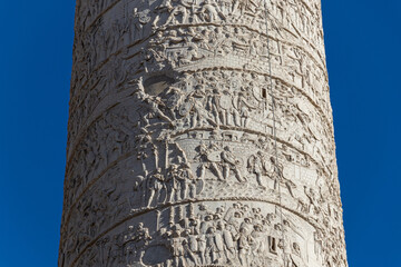 Close-up of the Trajan Column, Roman triumphal monument built by Emperor Trajan to celebrate the victory in Dacia Wars.