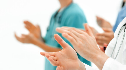 background image.groups of doctors applauding at the meeting