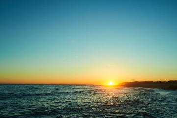 golden hour of a gorgeous winter sunset in a beach of Málaga in Andalucía