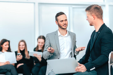 serious young business people discussing business issues.