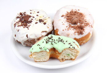 Two and Half Donuts on White Plate