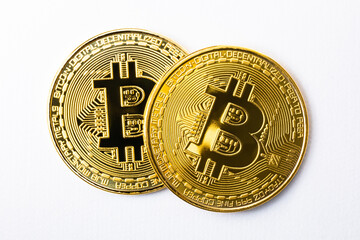 Two Bitcoins on The White Background, Virtual Currency or Cryptocurrency, Image of Economy and Business