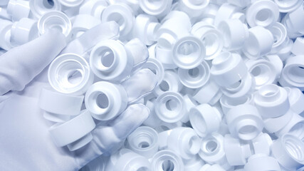 Parts of cosmetic plastic products  on the production line in industrial factory..