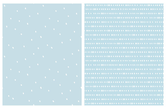 Seamless Hand Drawn Vector Patterns Set. White Irregular Dots and Spots Isolated on a Pastel Blue Background. Cute Abstract Doodle Print. Scribles and Daubs Made with Brushes.