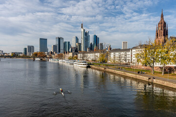 Obraz premium Frankfurt, Germany, November 2020: view on Frankfurt am Main, Germany Financial District and skyline, picture taken on bridge at main river